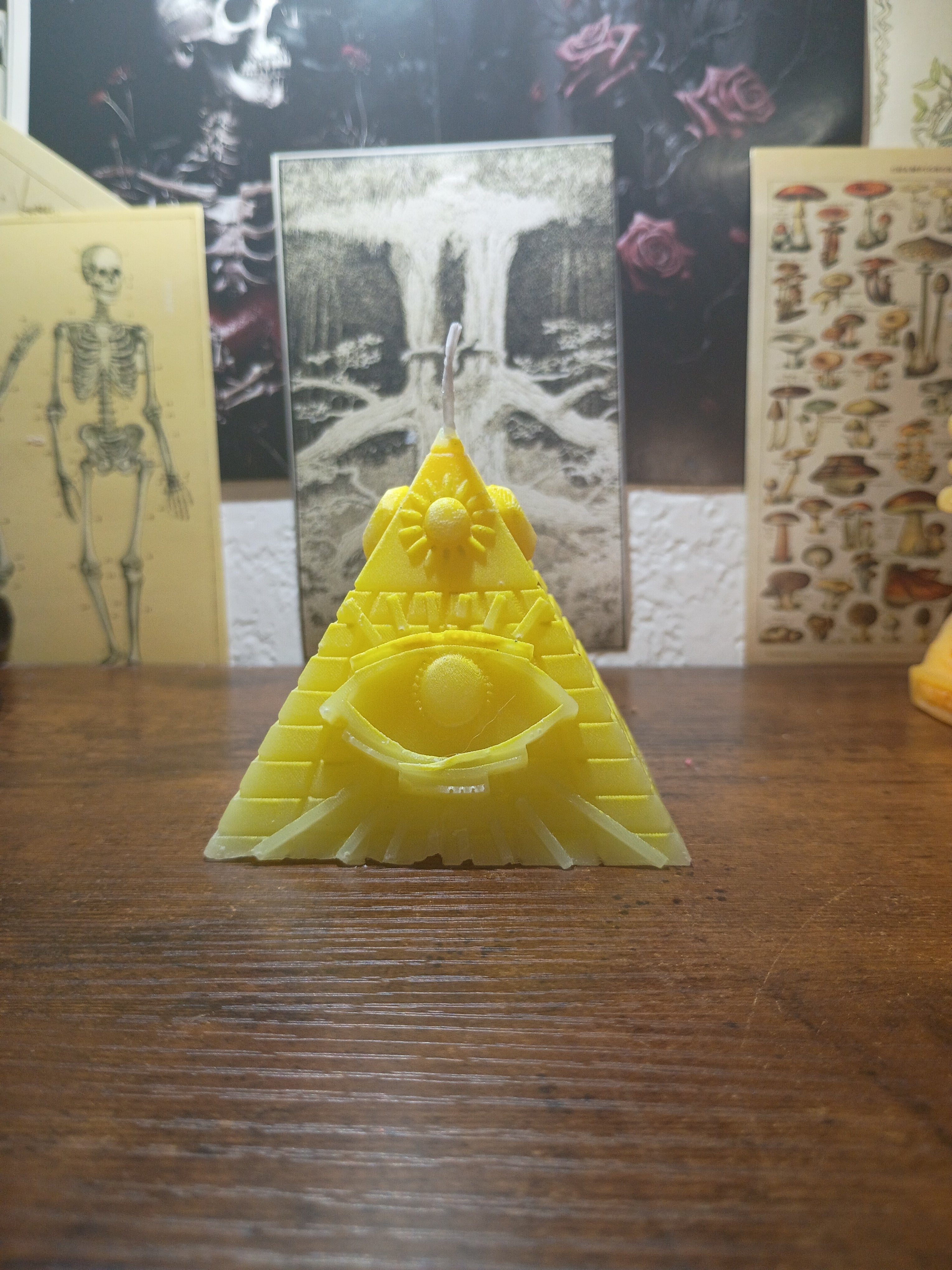 pyramid with eye candle