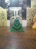 pyramid with eye candle