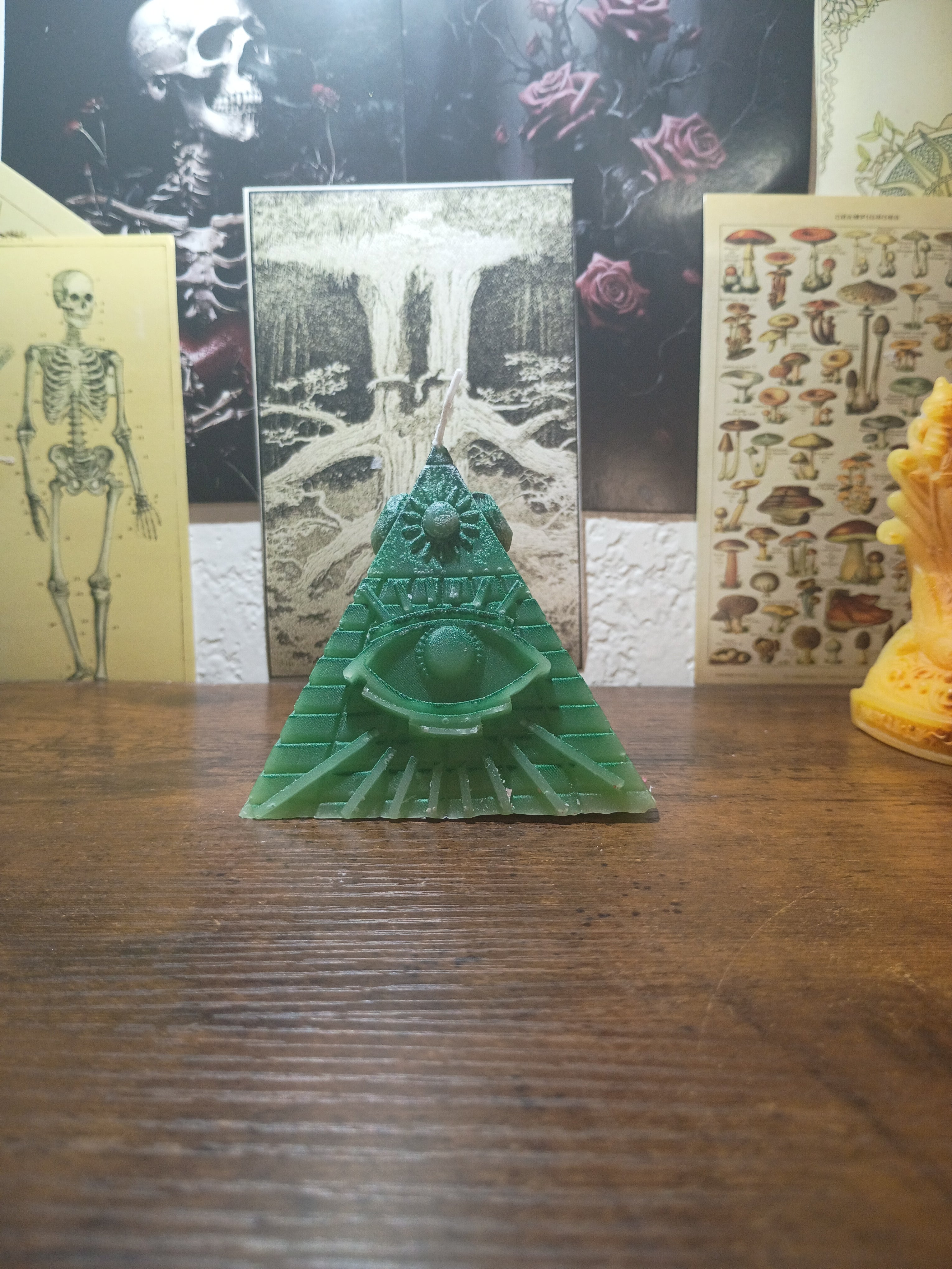 pyramid with eye candle