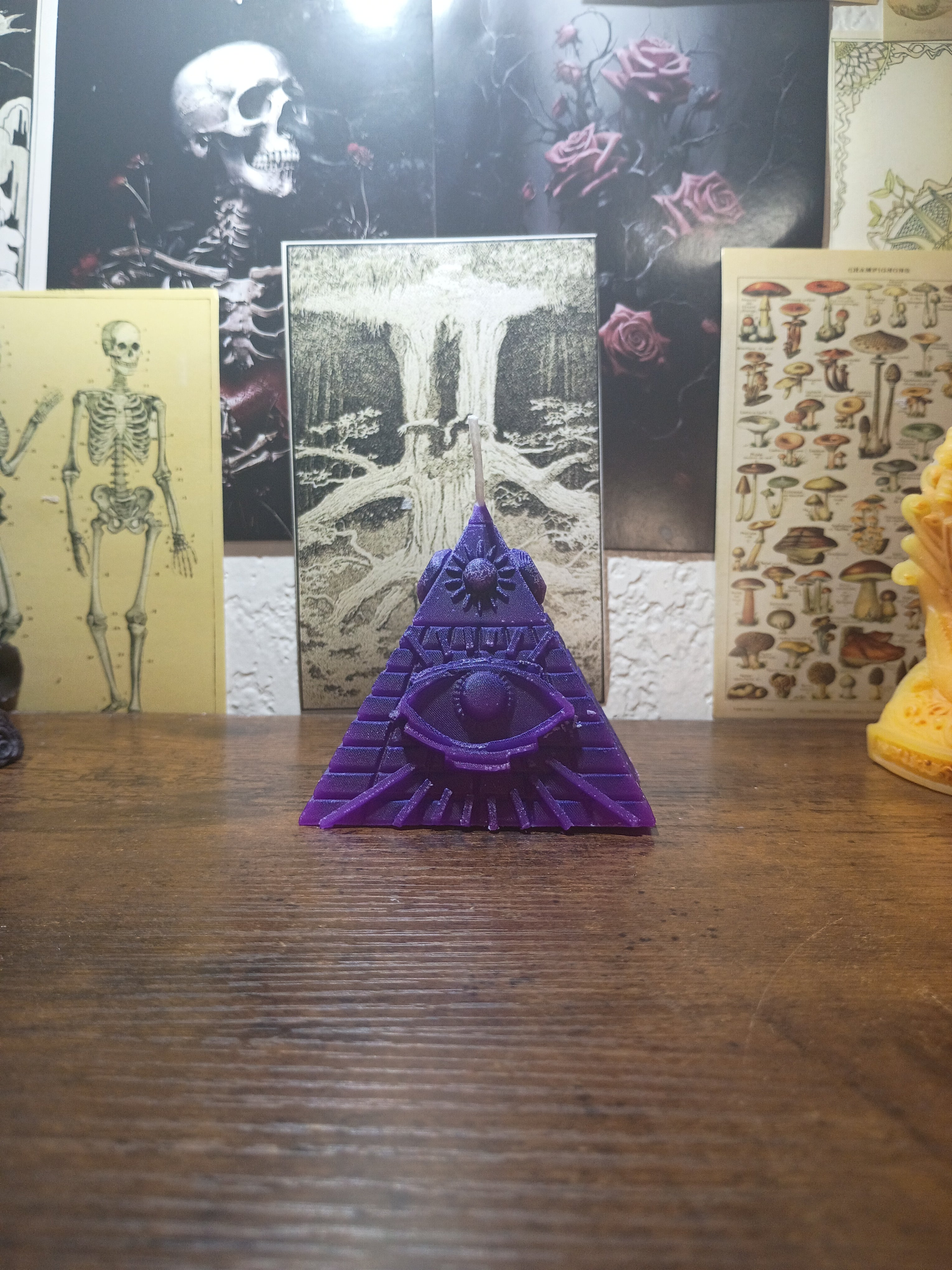 pyramid with eye candle