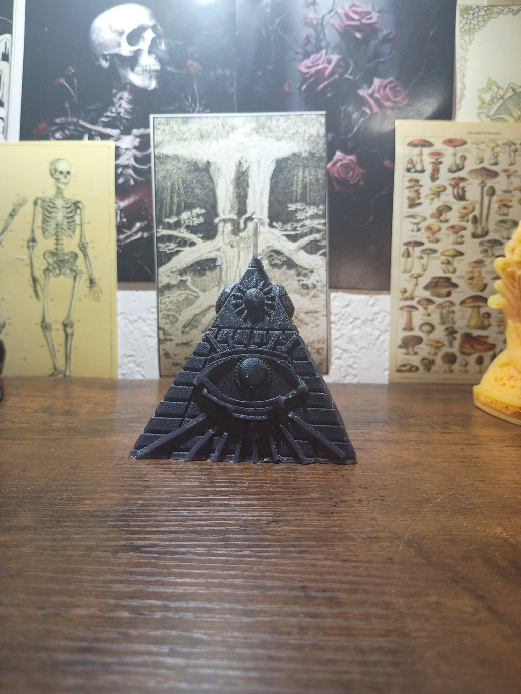 pyramid with eye candle