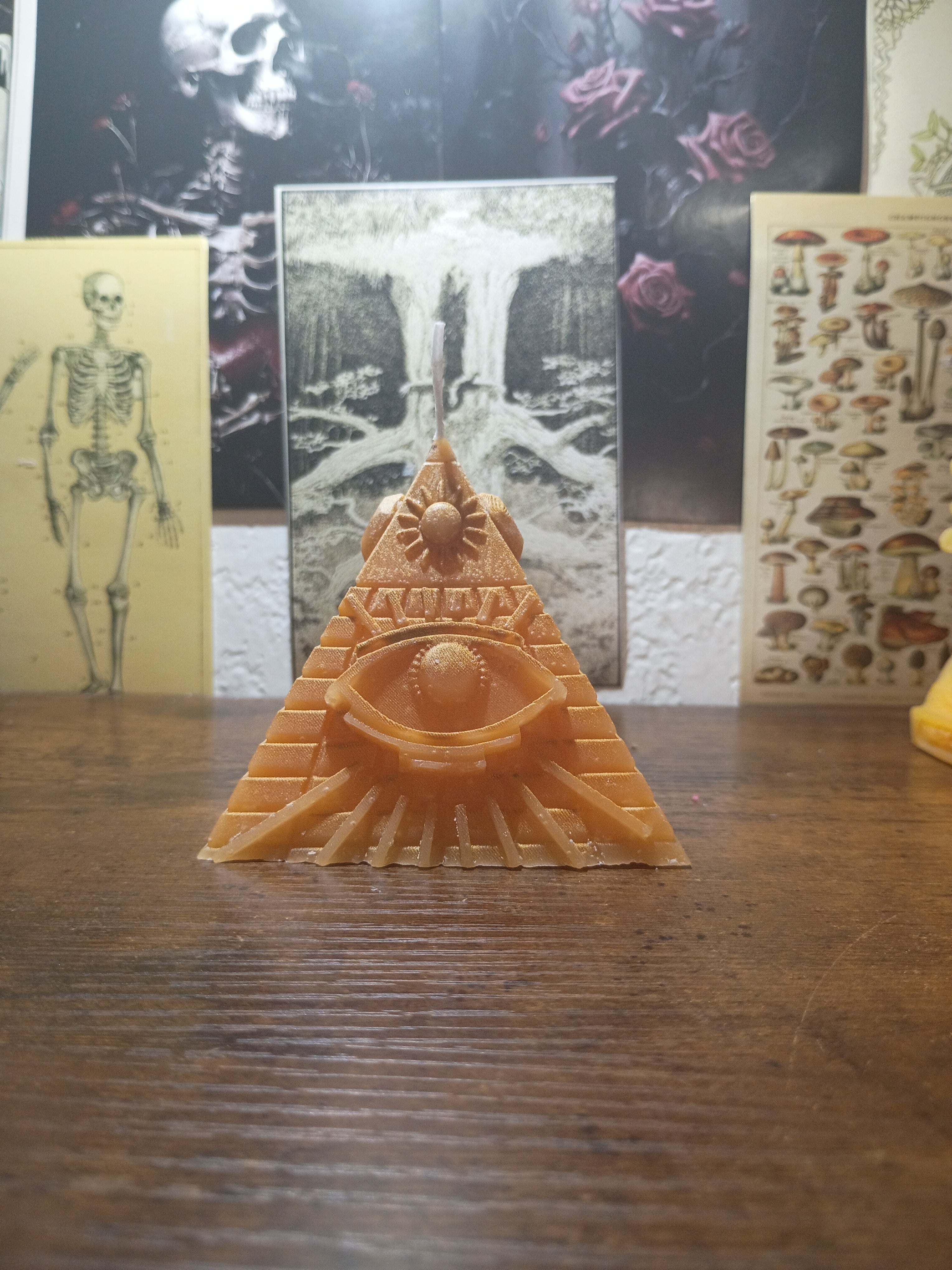 pyramid with eye candle