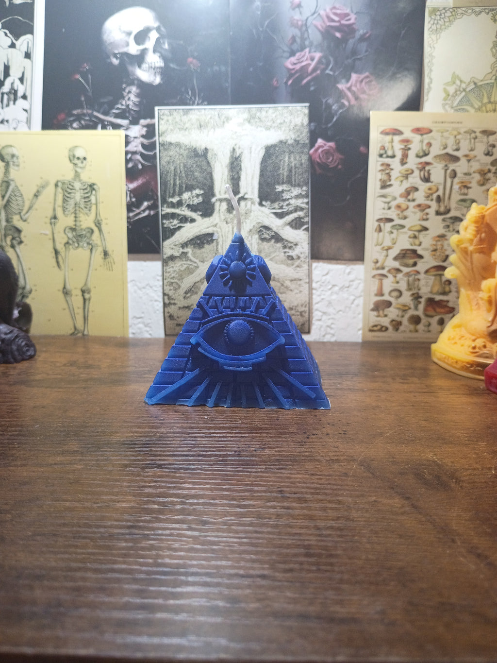 pyramid with eye candle