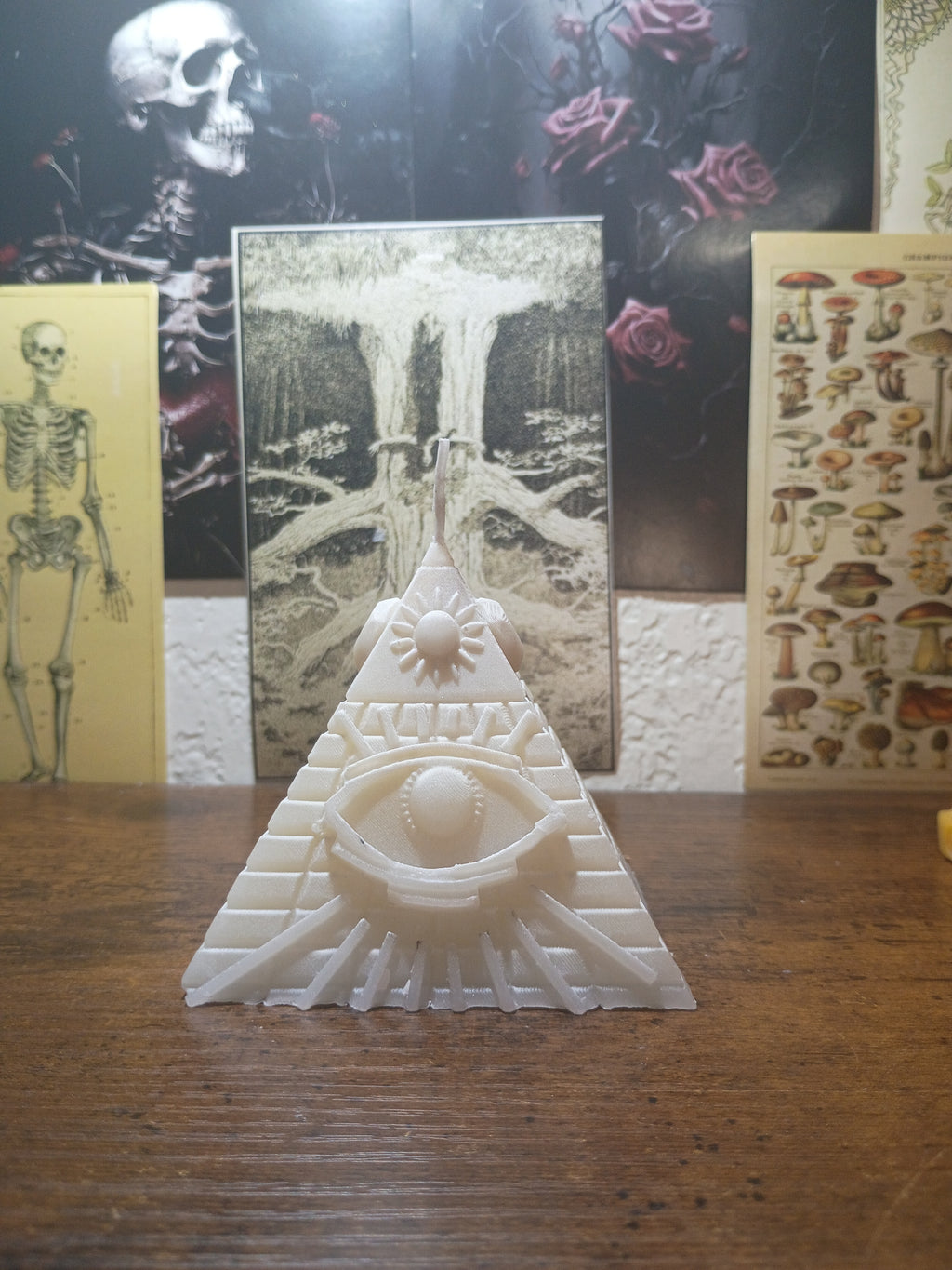 pyramid with eye candle