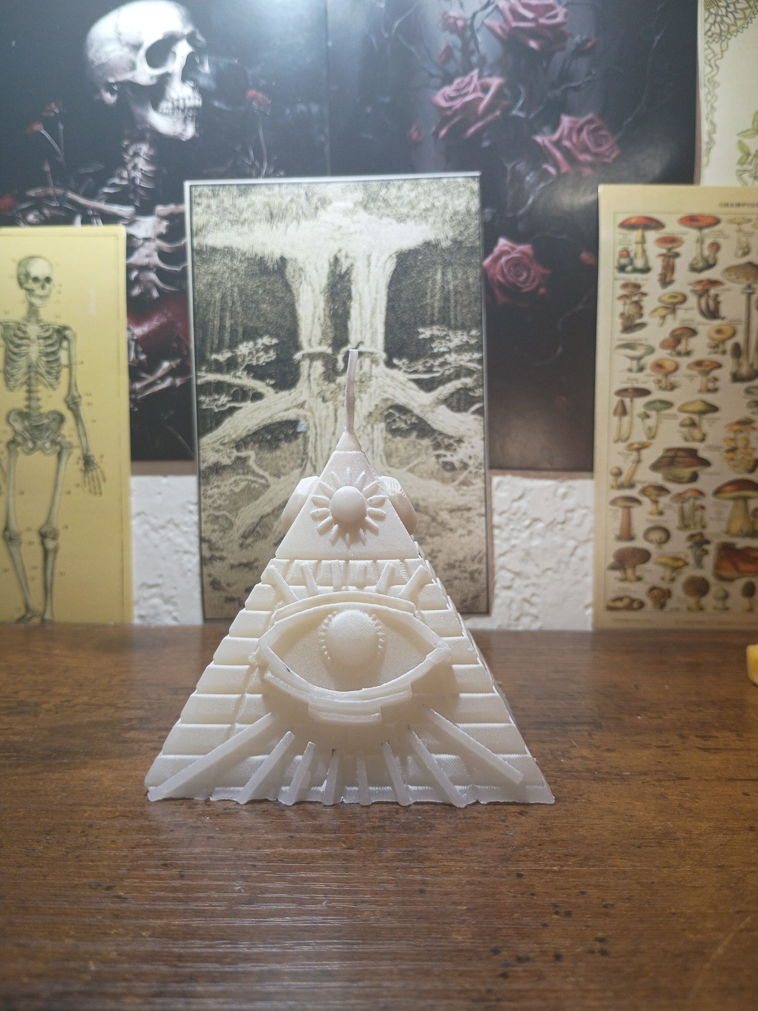 pyramid with eye candle